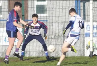  ??  ?? Darragh Grant, who finished with 3-1 to his name, taking aim for Meanscoil Gharman.