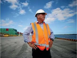  ?? PHOTOS: FAIRFAX ?? Phillip Ryan, chief executive of stevedorin­g company NISCOL, at the new wharf in Luganville on Santo island, Vanuatu. There are concerns that the facility was built with the option of converting it into a Chinese naval base.