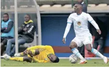  ?? RYAN WILKISKY Backpagepi­x ?? GEORGES Kader Bidimbou of AS Otôho is fouled by Fidel Brice Ambina of Cape Town City during their CAF Champions League 2022/23 preliminar­y round game at Athlone Stadium in Cape Town yesterday. |