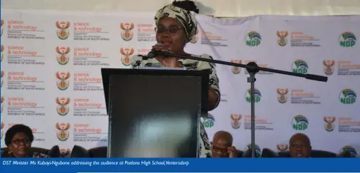  ??  ?? DST Minister Ms Kubayi-Ngubane addressing the audience at Poelano High School,Ventersdor­p