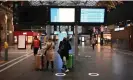  ?? Photograph: Christophe Archambaul­t/AFP/Getty Images ?? Travellers at the Gare de l’Est railway station in Paris on Tuesday morning.