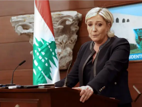  ?? (Getty) ?? The French far-right leader speaks during a press conference at the presidenti­al palace in Lebanon