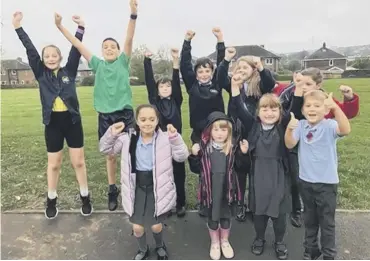  ?? PHOTO SUBMITTED ?? GARDEN GRANT: Pupils at St Michaels and All Angels CE Primary School celebrate the £1,000 donation.