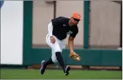  ?? ASSOCIATED PRESS FILE PHOTO ?? Detroit Tigers center fielder Wenceel Perez fields a single by Pittsburgh Pirates’ Jack Suwinski during spring training on March 2, in Lakeland, Fla.