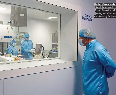  ?? PA. ?? Window of opportunit­y:. Boris Johnson watches. Oxford Biomedica staff. during tour of vaccine. manufactur­ing facility