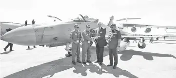  ??  ?? From left: Major Zulkifli ‘Steady’ Mohamad, and Major Fairul ‘Gillette’ Mohd Rustham pose for a photo with Britains’s retired senior Royal Air Force (RAF) commander Sir Andrew Pulford and RMAF chief General Tan Sri Affendi Buang, on March 27, 2019. — Bernama photo