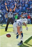  ?? THE ASSOCIATED PRESS ?? Indianapol­is Colts tight end Jack Doyle celebrates his 7-yard touchdown catch in the second half of Sunday’s 34-26 win against the Tennessee Titans in Nashville.