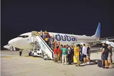  ?? ?? ■ Flydubai shuttle flights to Doha from Dubai World Central witnessed full capacity yesterday morning and afternoon.