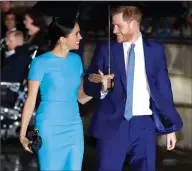  ?? AP File Photo by Kirsty Wiggleswor­th ?? In this March 5 file photo, Britain’s Prince Harry and Meghan, the Duke and Duchess of Sussex, arrive at the annual Endeavour Fund Awards in London.