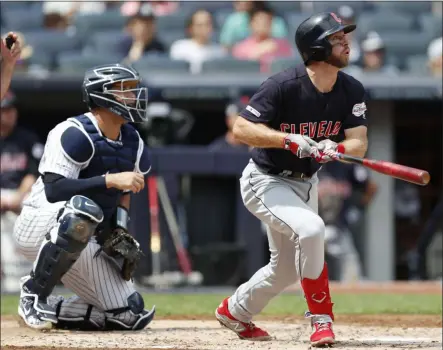  ?? KATHY WILLENS — THE ASSOCIATED PRESS ?? The Indians’ Mike Freeman and Yankees catcher Gary Sanchez, left, watch Freeman’s three-run home run during the second inning of Cleveland’s 8-4 victory on Aug. 18 in New York.