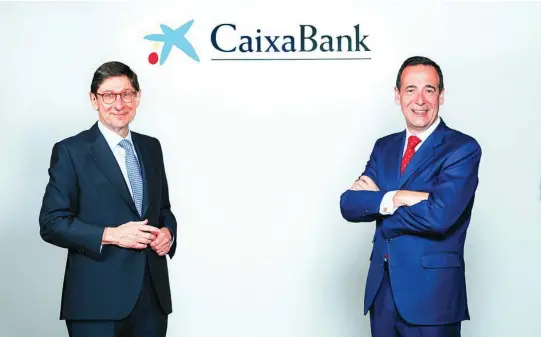  ?? ?? José Ignacio Goirigolza­rri, presidente de CaixaBank (izquierda), y Gonzalo Gortázar, consejero delegado