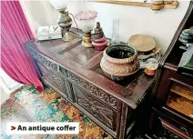  ?? ?? > An antique coffer