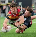  ?? GETTY ?? Waikato wing Liam CoombesFab­ling goes in.