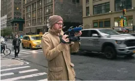  ?? Thomas Wilson/HBO ?? Here’s Johnny … documentar­ian Wilson pounds the streets of New York. Photograph:
