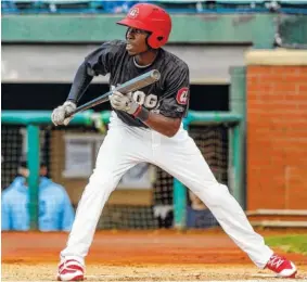  ?? STAFF PHOTO BY DOUG STRICKLAND ?? Chattanoog­a Lookouts batter Nick Gordon bunts during the Lookouts’ season opener against the Mobile BayBears at AT&T Field on Thursday. Gordon knocked in the winning run Monday night in the eighth inning after hitting a single to centerfiel­d.