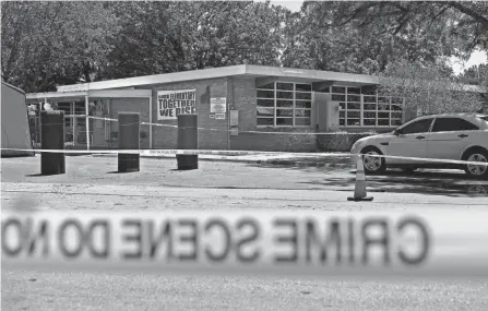  ?? JAE C. HONG/AP FILE ?? Crime scene tape surrounds Robb Elementary School after a mass shooting in Uvalde, Texas, May 25.