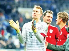  ?? — Reuters photo ?? Manuel Neuer has sat out Bayern's last three games with a thumb injury but is set to prove his fitness at Augsburg ahead of Tuesday's last 16, first leg against Jurgen Klopp's Liverpool at Anfield.