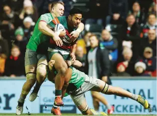  ??  ?? Danger man: Manu Tuilagi is tackled this time by Quins’ Alex Dombrandt