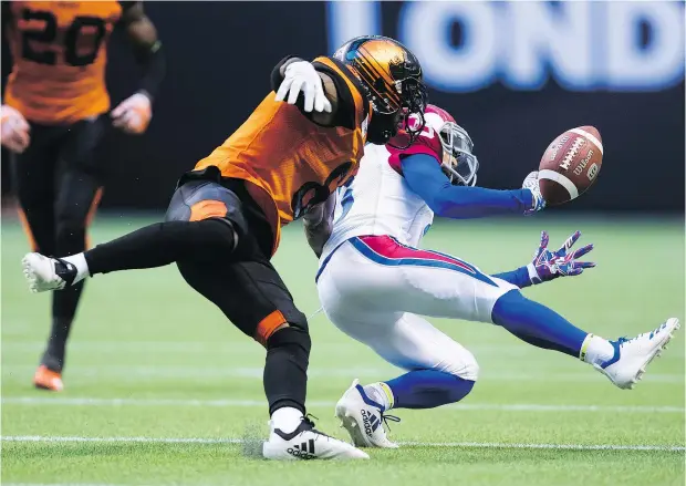  ?? — THE CANADIAN PRESS ?? Montreal’s Chris Williams fails to make the catch against Lions defender Marcell Young during Saturday’s season-opener in Vancouver. The Lions were 22-10 winners, ending a first week in which Western teams beat their Eastern counterpar­ts in three of...
