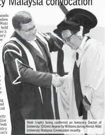  ??  ?? Yeoh (right) being conferred an honorary Doctor of University (DUniv) degree by Williams during Heriot-Watt University Malaysia Convocatio­n recently.