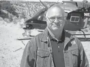  ?? KRQE TV VIA AP ?? Longtime reporter-videograph­er Bob Martin died Saturday night after the helicopter he was piloting crashed in central New Mexico, authoritie­s said.