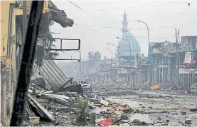  ?? AFP ?? Destrucció­n. Una vista de un barrio de Mosul, tras los ataques.