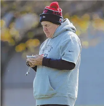  ?? STAFF PHOTO BY JOHN WILCOX ?? FOE, FOE, FOE: When it comes to fortifying a weakling AFC East opponent in the minds of his players, Bill Belichick is making a list and checking it twice.