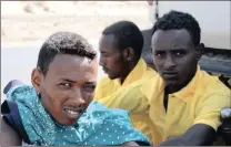  ?? PICTURE: REUTERS ?? Ethiopian refugees rest after arriving in Yemen on a smugglers boat last week