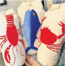  ?? CONTRIBUTE­D ?? In addition to painting on canvass, Patti Durkee also makes and paints buoy pillows.