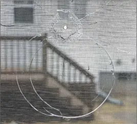  ?? LYNN CURWIN/TC MEDIA ?? An elderly east end resident was shocked when she opened the blind on her bedroom window Sunday morning and found a bullet had gone through the outer pane of glass.