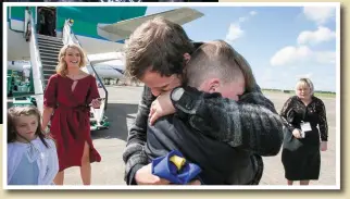  ?? Photos: Arthur Ellis ?? Mountainee­ring hero John Burke, who runs the Armada Hotel in Miltown Malbay, is welcomed home at Shannon Airport by his wife Aoibhín Garrihy after becoming the first Co Clare man to reach the summit on Mount Everest; right, John is greeted by his...