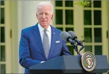  ?? ANDREW HARNIK/AP PHOTO ?? President Joe Biden listens Friday as Japanese Prime Minister Yoshihide Suga speaks at a news conference in the Rose Garden of the White House in Washington.