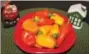  ?? MICHILEA PATTERSON — DIGITAL FIRST MEDIA ?? Different colored sweet peppers in a bowl are displayed. Vegetarian­ism and veganism may be dietary restrictio­ns that hosts of holiday dinners have to plan around.
