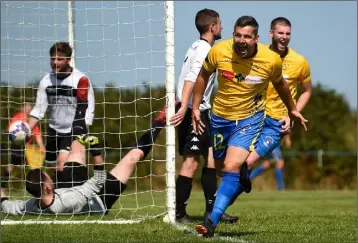  ??  ?? Jason Murphy shows his delight after scoring the North End goal.