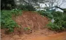  ??  ?? A mudslide leaves Kamehameha Highway coated near Pokole Point on 9 March. Photograph: Craig T Kojima/AP