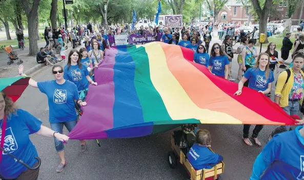  ??  ?? People travel on floats down Spadina Crescent during the Pride parade in 2015. This year’s Pride Festival, which runs until June 25, features events all around the city.