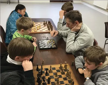  ??  ?? Locals enjoying chess at Glantane Chess club recently.