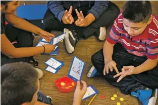  ?? Morgan Timms ?? Victor Angel, 10, completes math exercises alongside other fifth-graders Monday (Sept. 10) at Enos Garcia Elementary School in Taos.