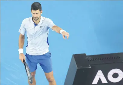  ?? Picture: AFP ?? ON YOUR WAY. Serbia’s Novak Djokovic celebrates after beating Croatia’s Dino Prizmic during the first round of the Australian Open in Melbourne yesterday.