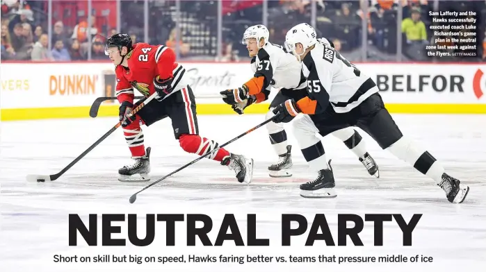  ?? GETTY IMAGES ?? Sam Lafferty and the Hawks successful­ly executed coach Luke Richardson’s game plan in the neutral zone last week against the Flyers.