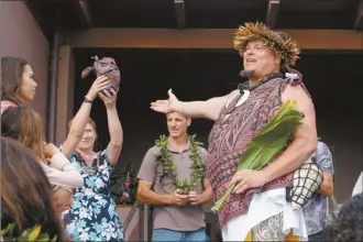  ?? HTA courtesy photo ?? Kumu U‘a blessed the future campus, with two of HTA Lāhainā’s founding teachers and West Maui residents, Jenelle Peterson and Ray Mohrman.