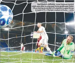  ??  ?? BayernF A PtsReal Madrid midfielder Lucas Vazquez (centre) celebrates after scoring past Roma goalkeeper Robin Olsen during yesterday’s Champions League GroupG match at the Olympic stadium in Rome. –