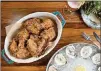  ?? CONTRIBUTE­D BY MIA YAKEL ?? Mary Hoopa’s House of Fried Chicken & Oysters whole house fried chicken and raw oysters.