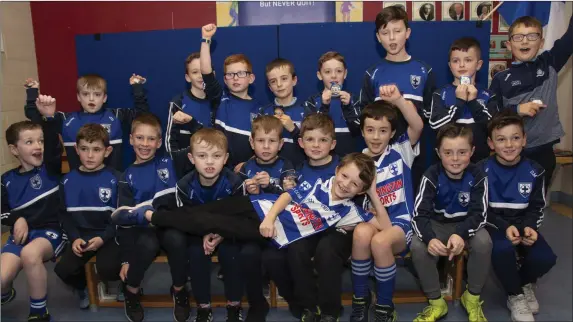  ??  ?? The Blessingto­n under-8 football team and their birthday boy enjoying the Blessingto­n GAA juvenile awards.