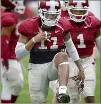  ?? NWA Democrat-Gazette/ANDY SHUPE ?? Arkansas defensive back Ryan Pulley warms up Wednesday at the university’s practice facility in Fayettevil­le. Pulley appears to be back in top form for the Razorbacks.