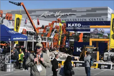  ?? SAM MORRIS / LAS VEGAS NEWS BUREAU FILE (2020) ?? Displays fill the parking lot Feb. 4, 2020, during the World of Concrete show at the Las Vegas Convention Center. The World of Concrete 2021 show has been delayed until June because of the coronaviru­s pandemic, but if it goes as planned it will be the first largescale trade show planned for the Las Vegas Convention Center’s new West Hall, a $980 million expansion project.