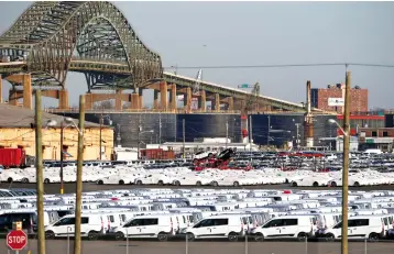  ??  ?? Vehicles are seen parked in a lot at the port of Newark New Jersey, US. The WTO forecast last September that global trade growth would slow to 3.7 per cent in 2019 from an estimated 3.9 per cent in 2018, but there could be a steeper slowdown or a rebound depending on policy steps, it said. — Reuters photo