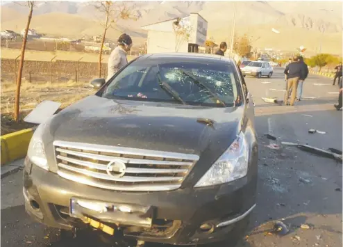  ?? West Asia News Agency ?? The scene of the attack that killed prominent Iranian scientist Mohsen Fakhrizade­h outside of Tehran on Friday.