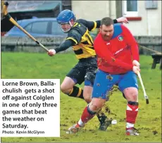  ?? Photo: Kevin McGlynn ?? Lorne Brown, Ballachuli­sh gets a shot off against Colglen in one of only three games that beat the weather on Saturday.