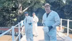  ?? PHOTO: CRT ?? Refugee volunteers working on Bull’s Swing Bridge.